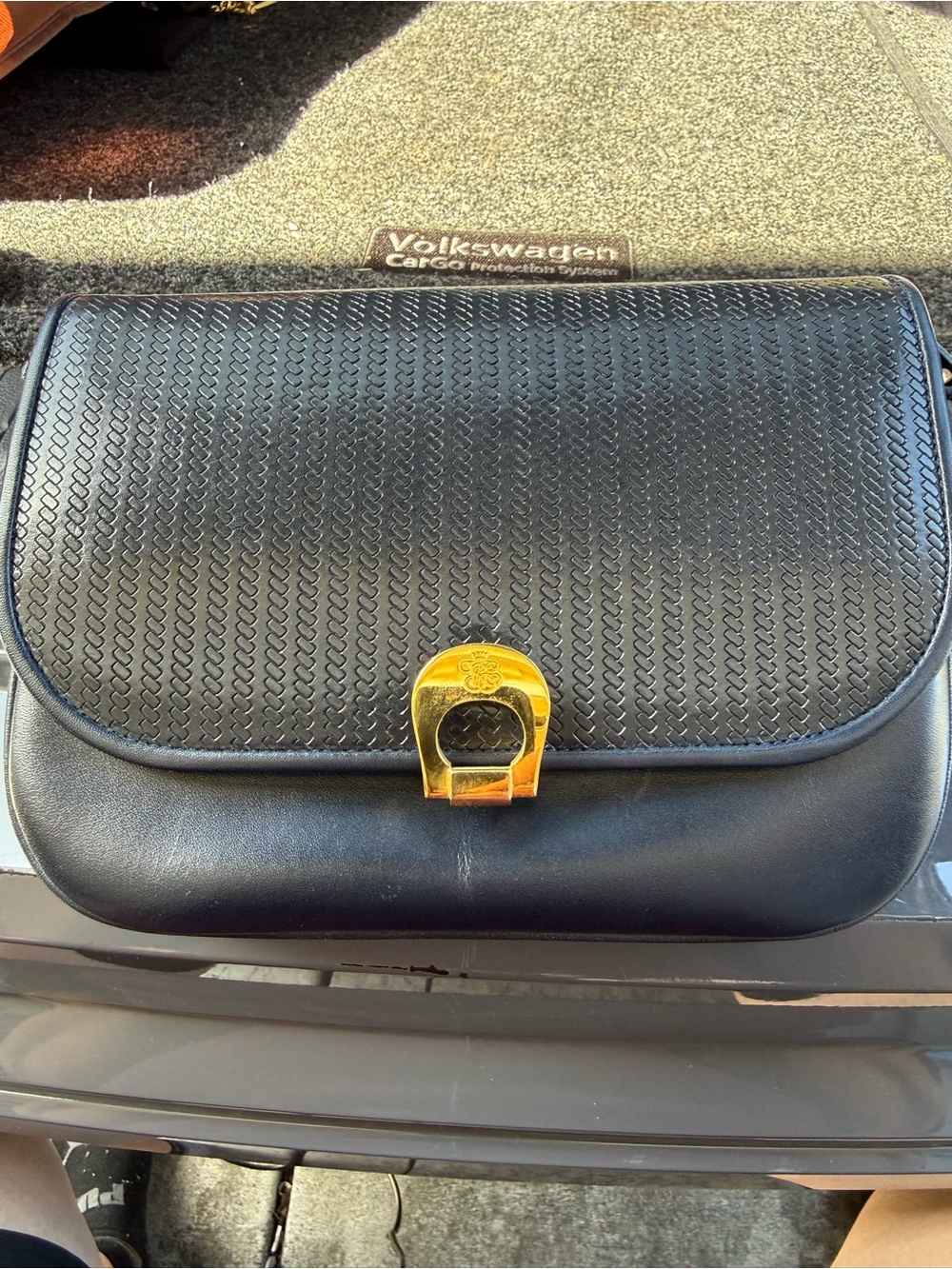 Black Textured Leather Shoulder Bag with Gold Turn-Lock by Orient Express